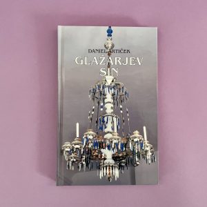 Knjiga Glažarjev greh je prikazana na gladki sivkasti podlagi, na naslovnici pa je bel in moder okrašen lestenec.